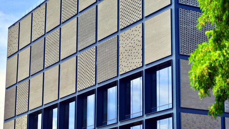 building-with-reflection-sky-clouds_991208-27066