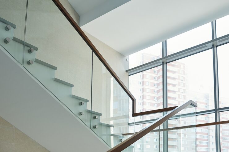 part-staircase-with-railings-large-window-inside-new-contemporary-business-center-office-building-with-many-floors_274679-13826